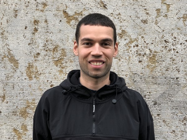 An image of Philippe Labrecque in front of a wall.